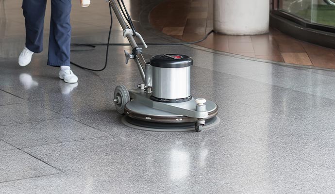 Commercial floor cleaning using equipment